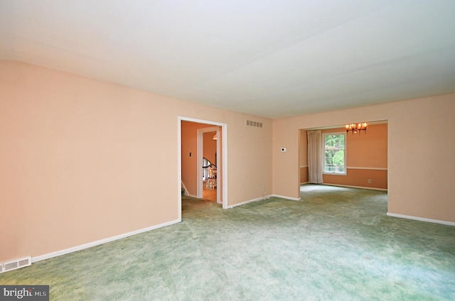 40 Brookside Dr, Holland, PA 18966 - unfurnished room featuring a chandelier, carpet flooring, and stairway