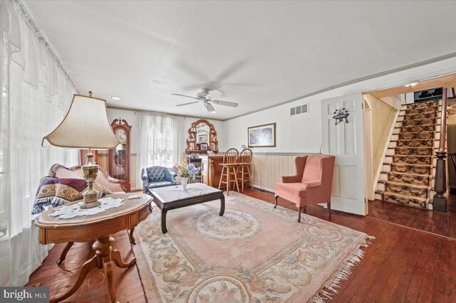 42 S Locust Ave, Marlton, NJ 08053 - living area featuring stairway, wood-type flooring, a ceiling fan, and wainscoting