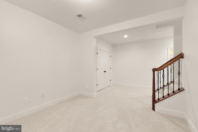 7521 Westfield Dr, Bethesda, MD 20817 - unfurnished room with carpet flooring, baseboards, stairs, and recessed lighting