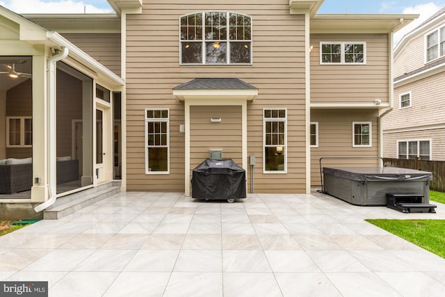 7521 Westfield Dr, Bethesda, MD 20817 - rear view of property with a hot tub and a patio