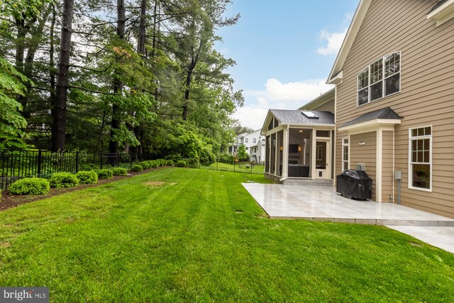 7521 Westfield Dr, Bethesda, MD 20817 - view of yard featuring a sunroom and a patio