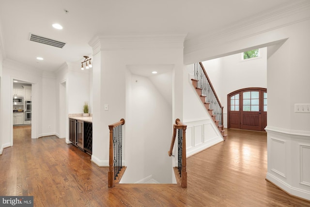 7521 Westfield Dr, Bethesda, MD 20817 - entrance foyer featuring crown molding, wood finished floors, and recessed lighting