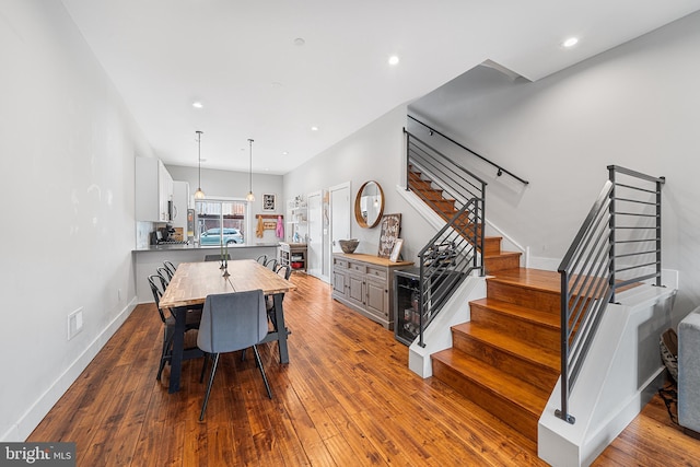 2650 E Huntingdon St, Philadelphia, PA 19125 - dining space featuring dark wood-style flooring, baseboards, recessed lighting, and stairs