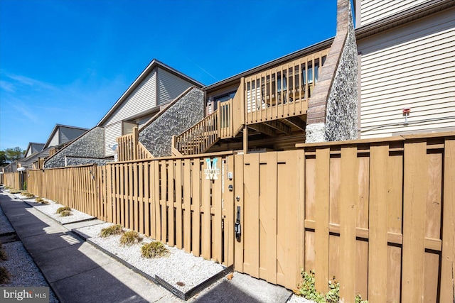 105 120th St Unit 111, Ocean City, MD 21842 - view of home's exterior with fence and stairway