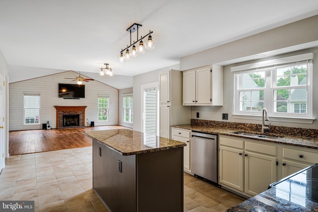 218 Foxborough Dr SW, Leesburg, VA 20175 - kitchen with a sink, stainless steel dishwasher, a wealth of natural light, and a center island