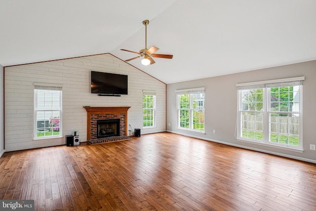218 Foxborough Dr SW, Leesburg, VA 20175 - unfurnished living room featuring ceiling fan, lofted ceiling, hardwood / wood-style floors, and a healthy amount of sunlight