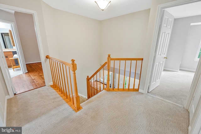 218 Foxborough Dr SW, Leesburg, VA 20175 - stairway with carpet floors and baseboards