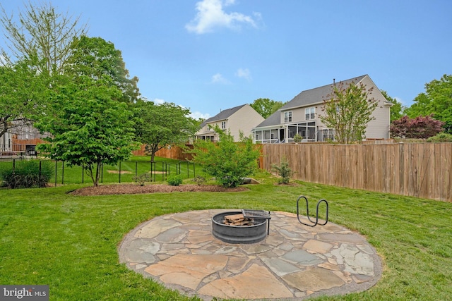218 Foxborough Dr SW, Leesburg, VA 20175 - view of yard featuring an outdoor fire pit, fence, and a patio