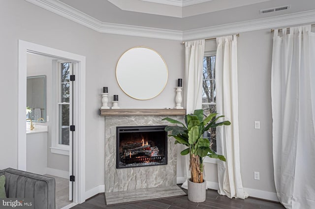 1032 Terrace Gln, Baltimore, MD 21210 - living room with wood finished floors, a fireplace, baseboards, ornamental molding, and a tray ceiling