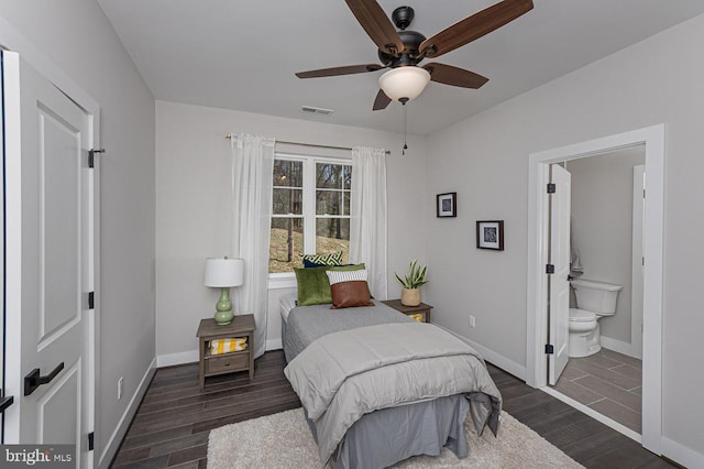 1032 Terrace Gln, Baltimore, MD 21210 - bedroom featuring wood finished floors, baseboards, ensuite bath, and ceiling fan