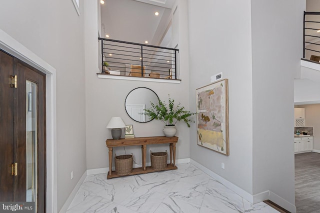 1032 Terrace Gln, Baltimore, MD 21210 - entrance foyer featuring marble finish floors, a high ceiling, baseboards, and recessed lighting