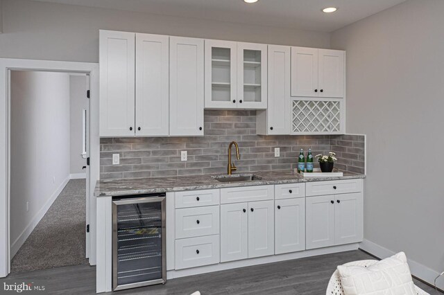 1032 Terrace Gln, Baltimore, MD 21210 - bar area with a sink, beverage cooler, baseboards, dark wood-style floors, and recessed lighting