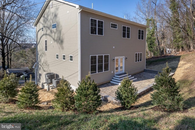 1032 Terrace Gln, Baltimore, MD 21210 - back of property featuring french doors, central AC unit, and a patio area
