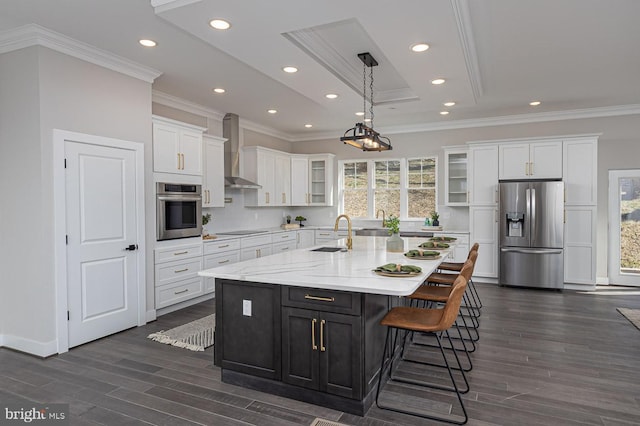 1032 Terrace Gln, Baltimore, MD 21210 - kitchen featuring stainless steel appliances, wall chimney exhaust hood, white cabinetry, a sink, and dark wood finished floors