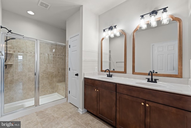5957 Whelan Ln, Frederick, MD 21703 - full bathroom featuring double vanity, a stall shower, and tile patterned floors