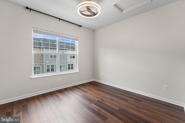 5957 Whelan Ln, Frederick, MD 21703 - unfurnished room with baseboards, dark wood-style floors, and attic access