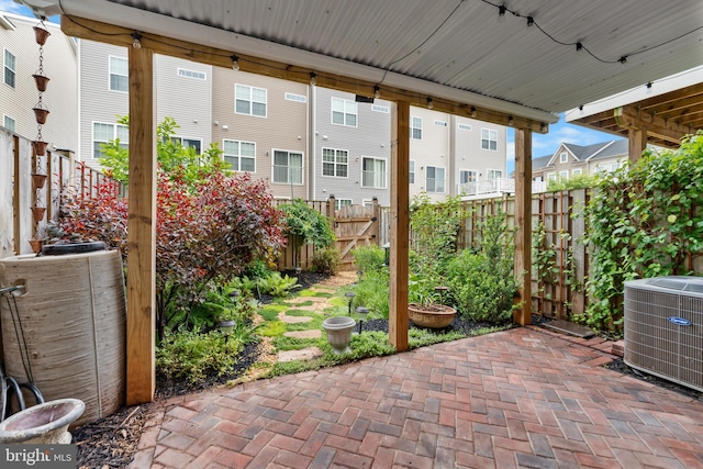 5957 Whelan Ln, Frederick, MD 21703 - fenced backyard featuring central AC unit and a patio