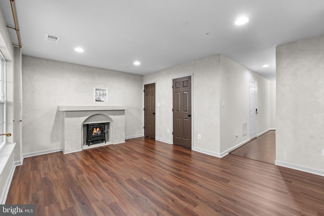 5957 Whelan Ln, Frederick, MD 21703 - unfurnished living room with recessed lighting, wood finished floors, baseboards, and a lit fireplace