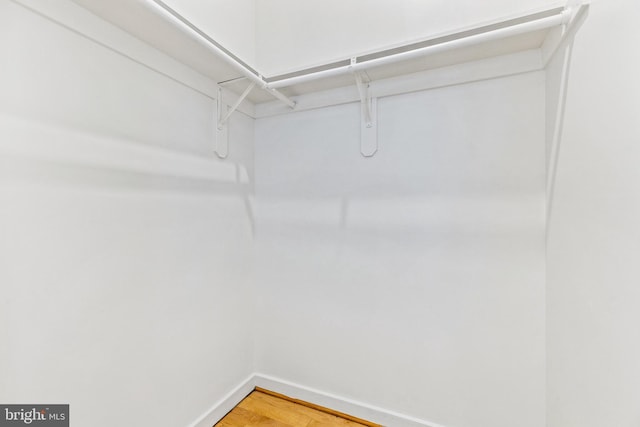 2412 17th St NW Unit 102, Washington, DC 20009 - walk in closet with light wood finished floors