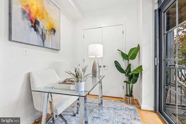 2412 17th St NW Unit 102, Washington, DC 20009 - home office with wood finished floors and baseboards