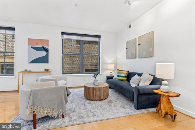 2412 17th St NW Unit 102, Washington, DC 20009 - living area with wood finished floors and baseboards