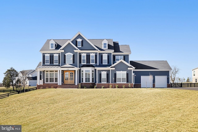 view of front of property with a front lawn, french doors, fence, and a garage