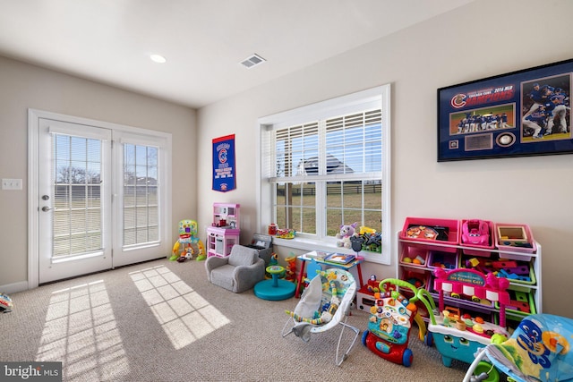 playroom with baseboards, visible vents, recessed lighting, and carpet