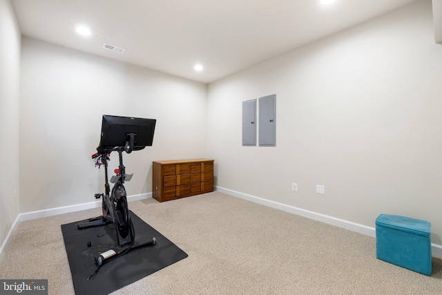 workout room featuring carpet flooring, electric panel, visible vents, and recessed lighting