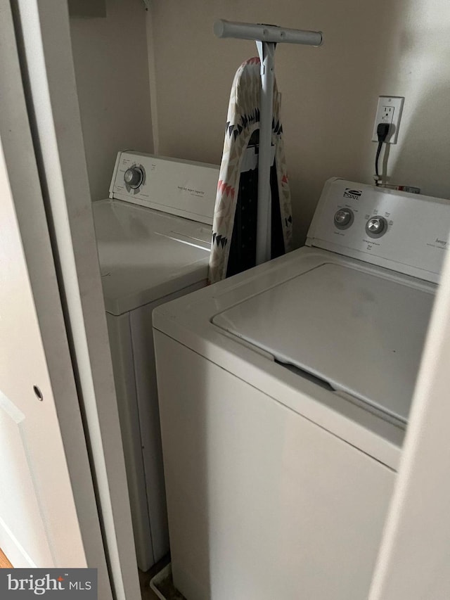 laundry room featuring washer and dryer