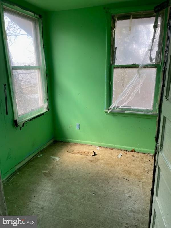 empty room featuring tile patterned floors