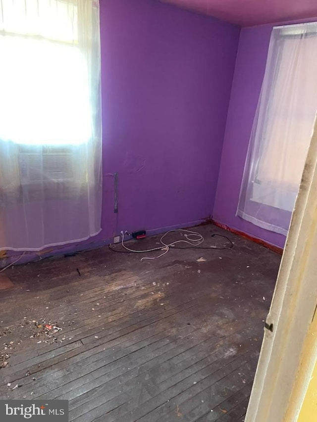 spare room featuring hardwood / wood-style flooring