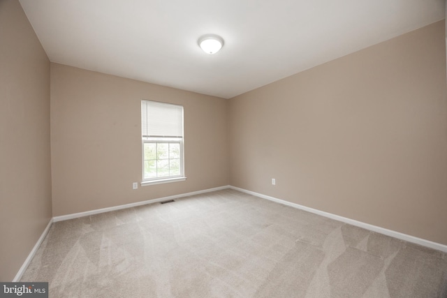 485 Lake George Cir, West Chester, PA 19382 - spare room with visible vents, light colored carpet, and baseboards