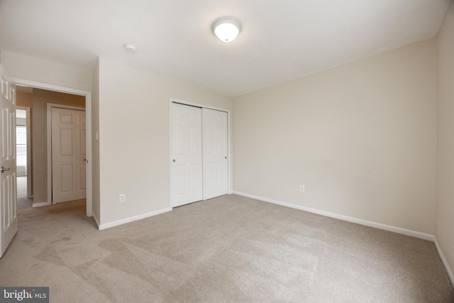 485 Lake George Cir, West Chester, PA 19382 - unfurnished bedroom featuring baseboards and light carpet