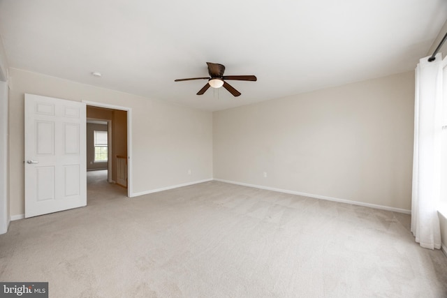 485 Lake George Cir, West Chester, PA 19382 - unfurnished bedroom featuring light carpet, ceiling fan, and baseboards