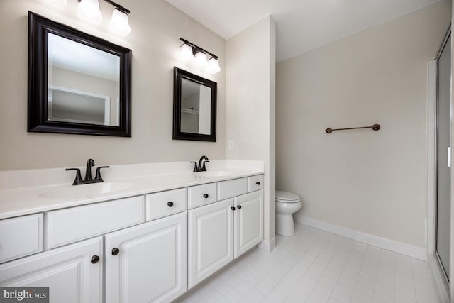 485 Lake George Cir, West Chester, PA 19382 - full bathroom with double vanity, a sink, tile patterned flooring, and baseboards