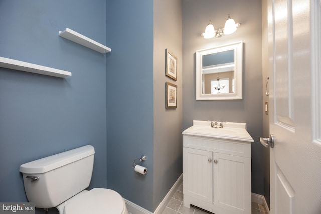 485 Lake George Cir, West Chester, PA 19382 - half bathroom with tile patterned floors, toilet, vanity, and baseboards