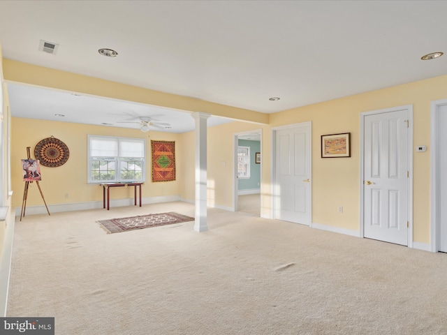 112 Daniel Ct, Strasburg, VA 22657 - unfurnished living room with carpet flooring, ornate columns, baseboards, and visible vents
