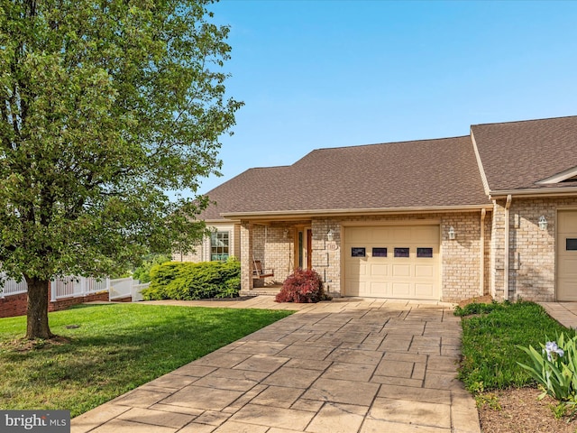 112 Daniel Ct, Strasburg, VA 22657 - view of front facade with a shingled roof, an attached garage, a front lawn, brick siding, and driveway