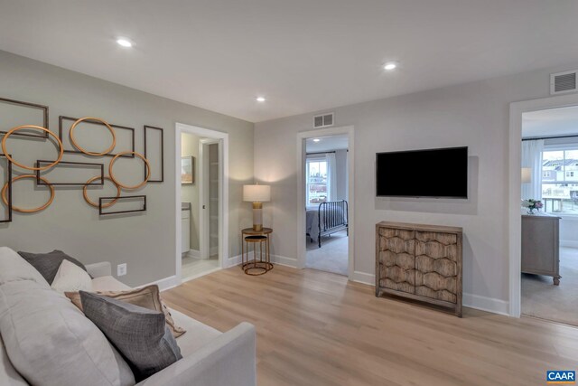 3065 Rambling Brook Ln, Crozet, VA 22932 - living room featuring baseboards, visible vents, light wood-style flooring, and recessed lighting