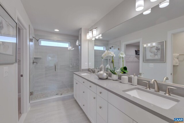 3065 Rambling Brook Ln, Crozet, VA 22932 - full bathroom featuring a shower stall, double vanity, and a sink
