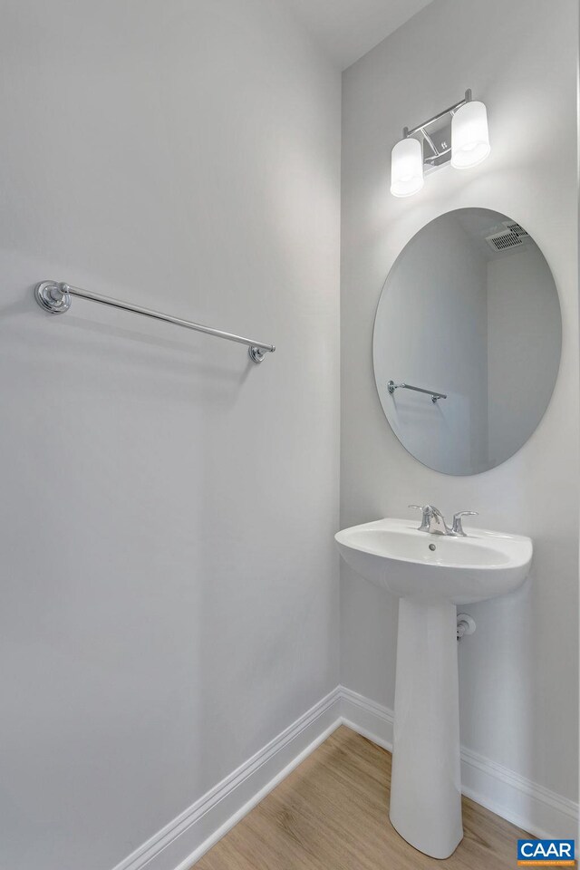 3065 Rambling Brook Ln, Crozet, VA 22932 - bathroom with baseboards and wood finished floors