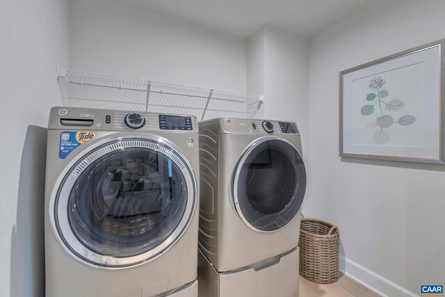 3065 Rambling Brook Ln, Crozet, VA 22932 - laundry area featuring baseboards, laundry area, and washer and clothes dryer