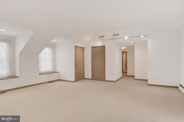 662 S Market St, Elizabethtown, PA 17022 - additional living space featuring light colored carpet, vaulted ceiling, baseboards, and recessed lighting