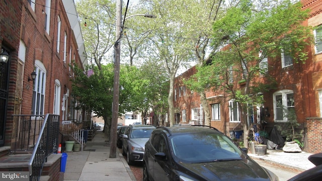 2329 S Woodstock St, Philadelphia, PA 19145 - view of street with sidewalks, curbs, and street lights