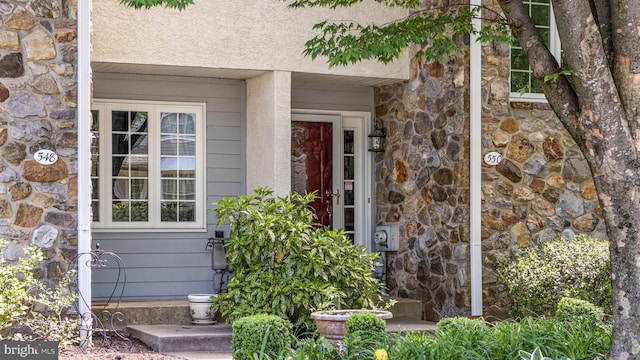 550 E Saxony Dr Unit 550, Exton, PA 19341 - doorway to property with stone siding