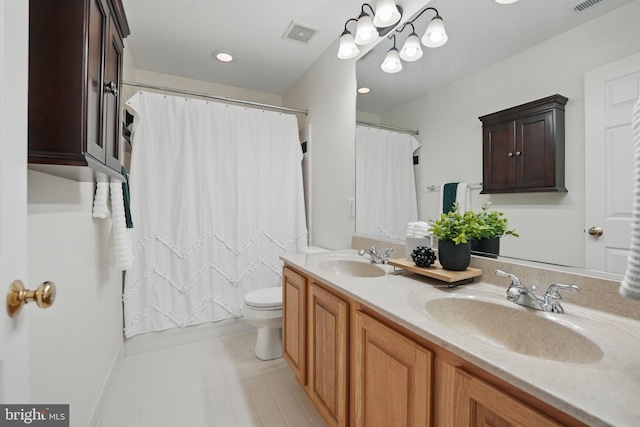 bathroom featuring a sink, visible vents, toilet, and a shower with shower curtain