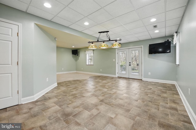 unfurnished room with recessed lighting, visible vents, baseboards, and a drop ceiling