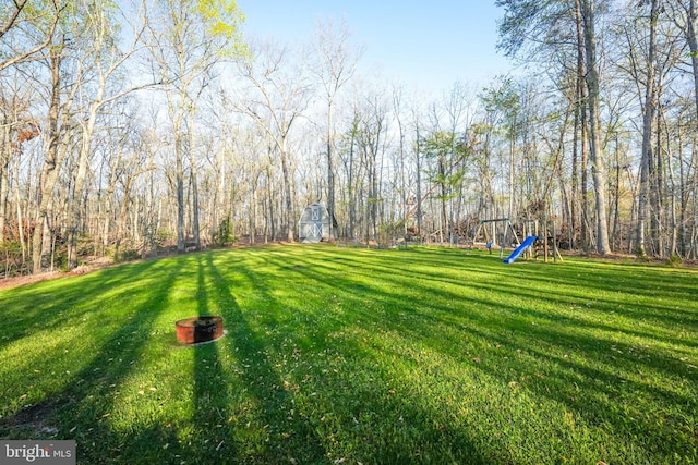 view of yard featuring a playground