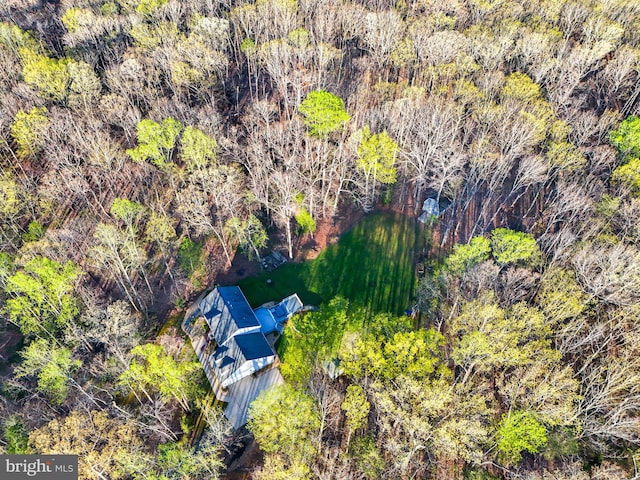 aerial view featuring a view of trees