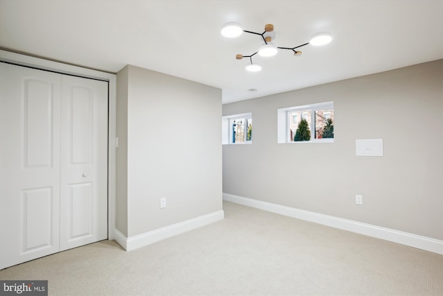 329 15th St NE, Washington, DC 20002 - unfurnished bedroom featuring carpet flooring, baseboards, and a closet